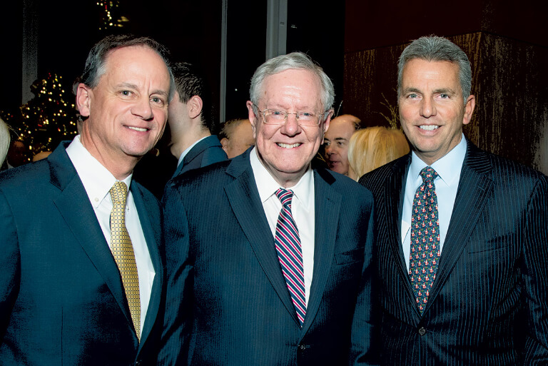 John Greed, Chairman, President and CEO, and William Rose, Chief Marketing Office, with Steve Forbes, Chairman and Editor-in-Chief of Forbes Media (center), celebrating the launch of the documentary film, In Money We Trust?, sponsored in part by Mutual of America.